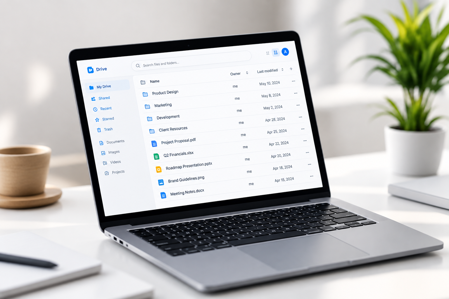 A laptop on a bright desk showing an email inbox and campaign list